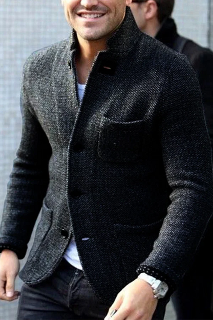 Mann in grauem Tweed-Blazer, modisch, elegant, Herrenmode, Herbstjacke, Freizeitkleidung.