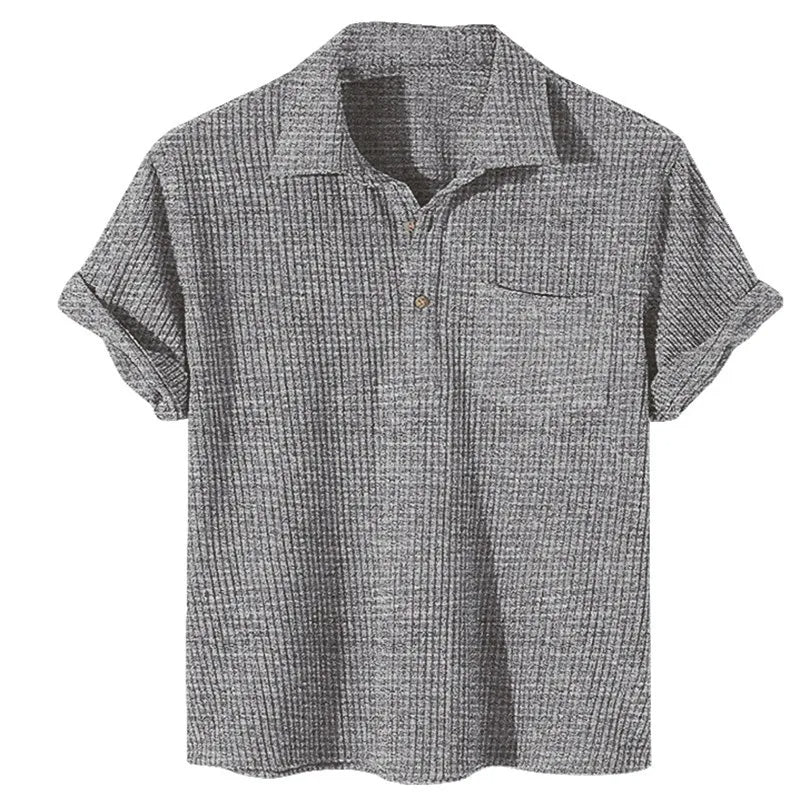 Graues Herren-Poloshirt aus Baumwolle, kurzärmelig, geripptes Design, klassischer Kragen.
