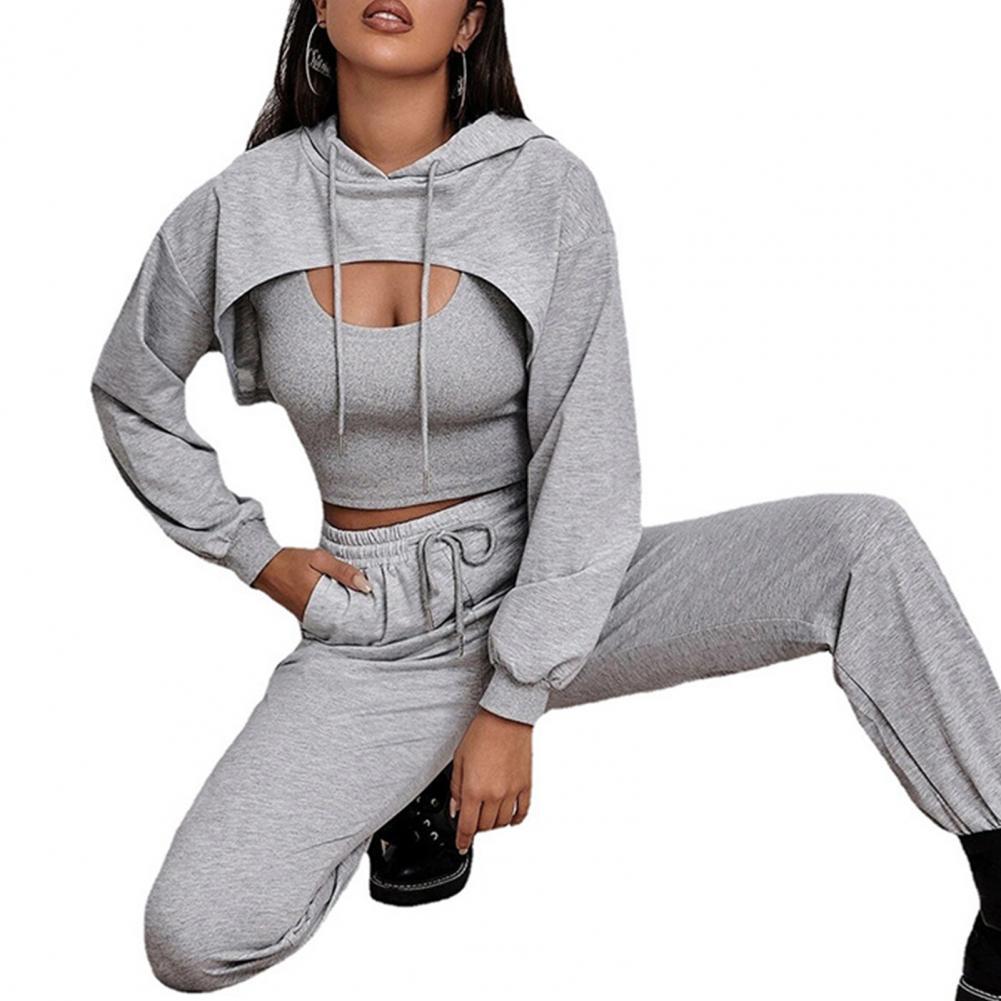 Graues Damen-Sportset, Kapuzenpullover und Jogginghose, bequem, modisch, Freizeitkleidung.