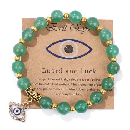 Grünes Aventurin-Armband mit goldenen Perlen und Nazar-Anhänger für Schutz und Glück.
