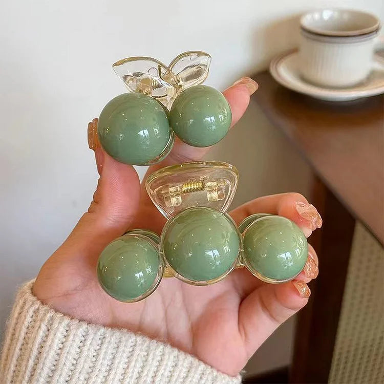 Grüner Haarclip mit Kugeln, transparent, modisch, Damen-Accessoire, stilvoll, elegant.