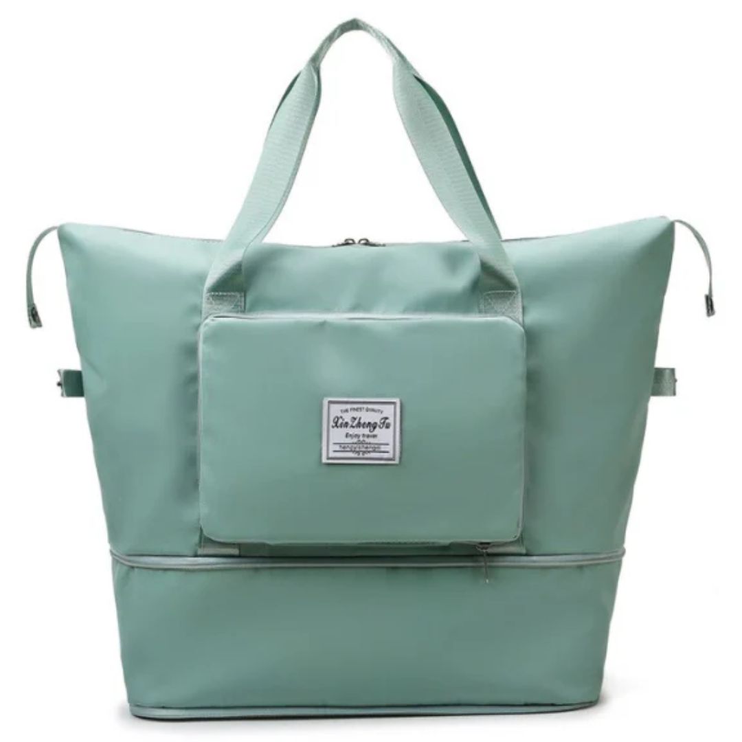 Grüne Reisetasche aus Nylon mit Reißverschluss und Fronttasche, ideal für Reisen und Alltag.