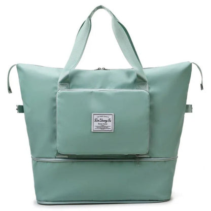 Grüne Reisetasche aus Nylon mit Reißverschluss und Fronttasche, ideal für Reisen und Alltag.