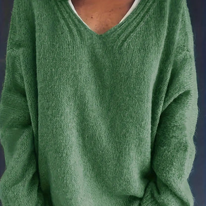 Grüner Damenpullover aus Strick, V-Ausschnitt, weiches Material, modisch, bequem.