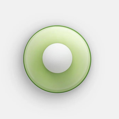Grüne runde Deckenleuchte aus Glas, moderne LED-Lampe, minimalistisch, energiesparend.