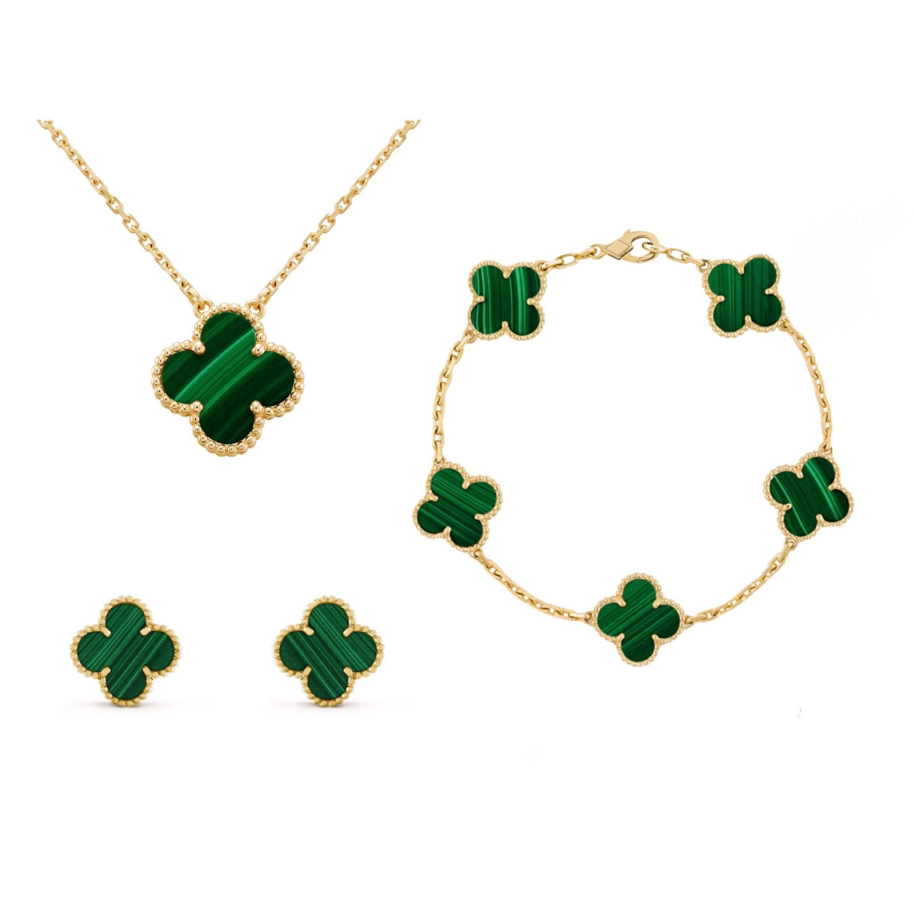 Goldene Schmuckset mit grünen Kleeblatt-Anhängern: Halskette, Armband, Ohrringe.