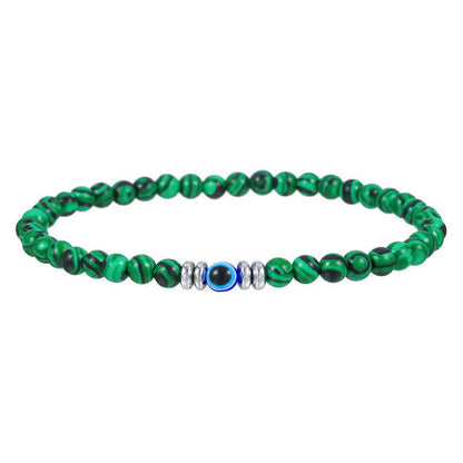 Grünes Malachit-Armband mit silbernen Akzenten, elastisch, Schmuck für Damen und Herren.