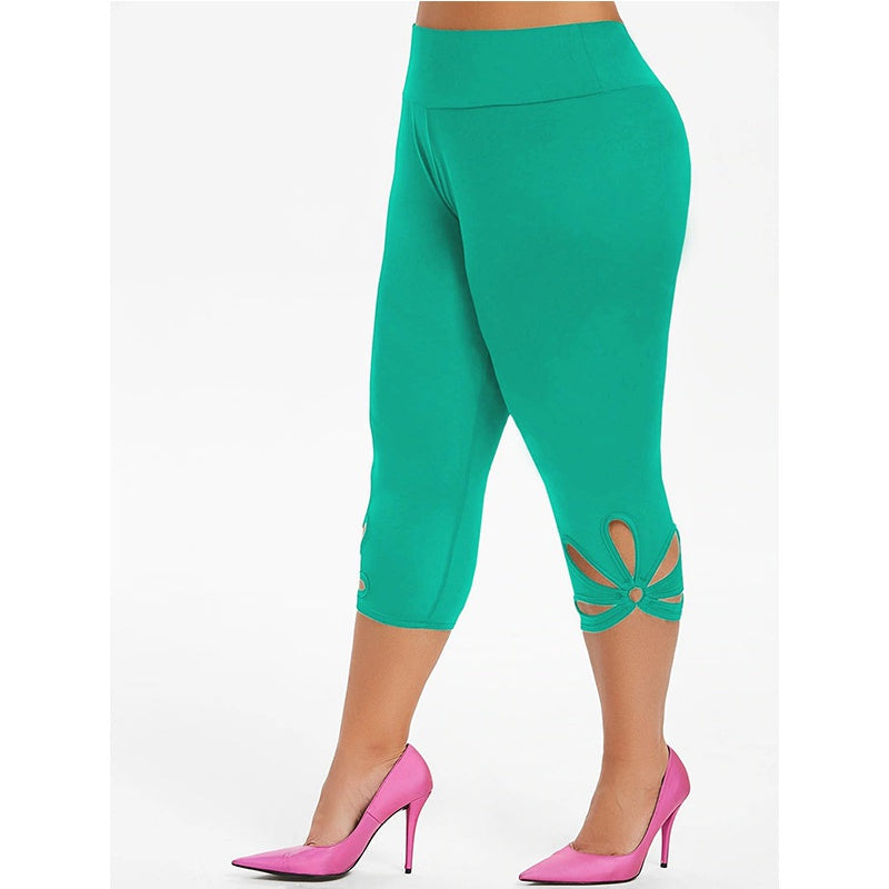 Damen Capri-Leggings grün mit Cut-Outs, elastisch, modisch, Sommermode, bequeme Passform.