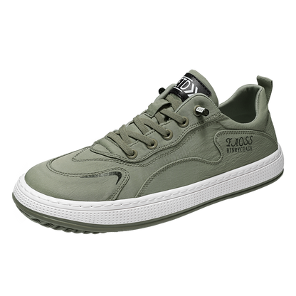 Grüner Sneaker für Herren, sportlich, bequem, mit weißer Sohle, ideal für Freizeit und Alltag.