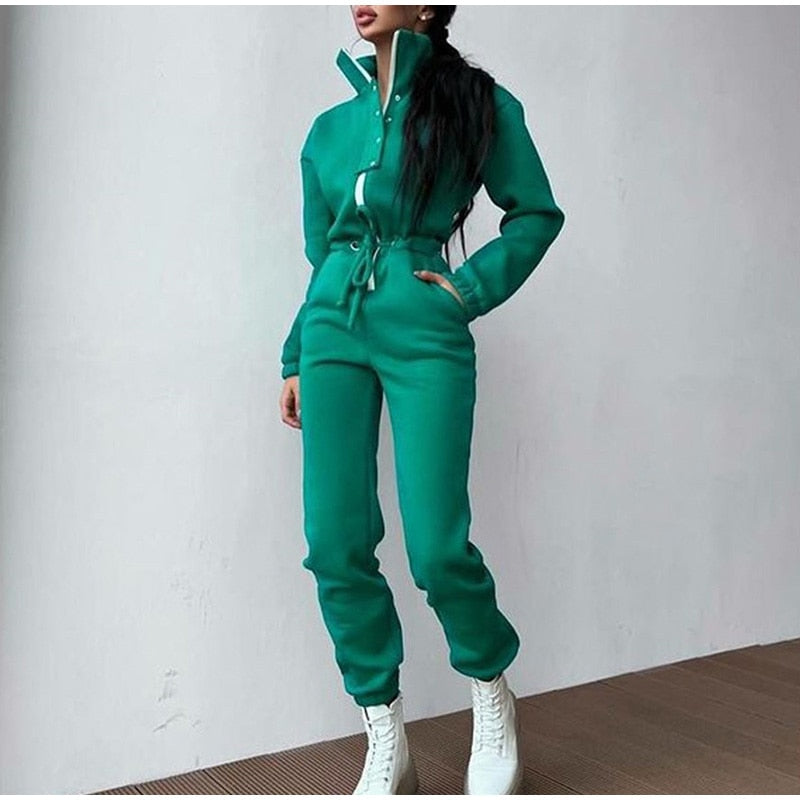 Grüner Damen-Jumpsuit mit Reißverschluss, langärmelig, modisch, bequem, Freizeitkleidung.