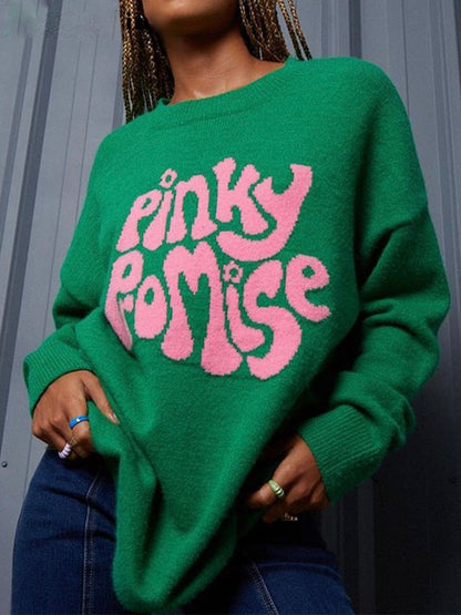 Grüner Pullover mit rosa "Pinky Promise" Schriftzug, Damenmode, Strick, lässig, Herbst.