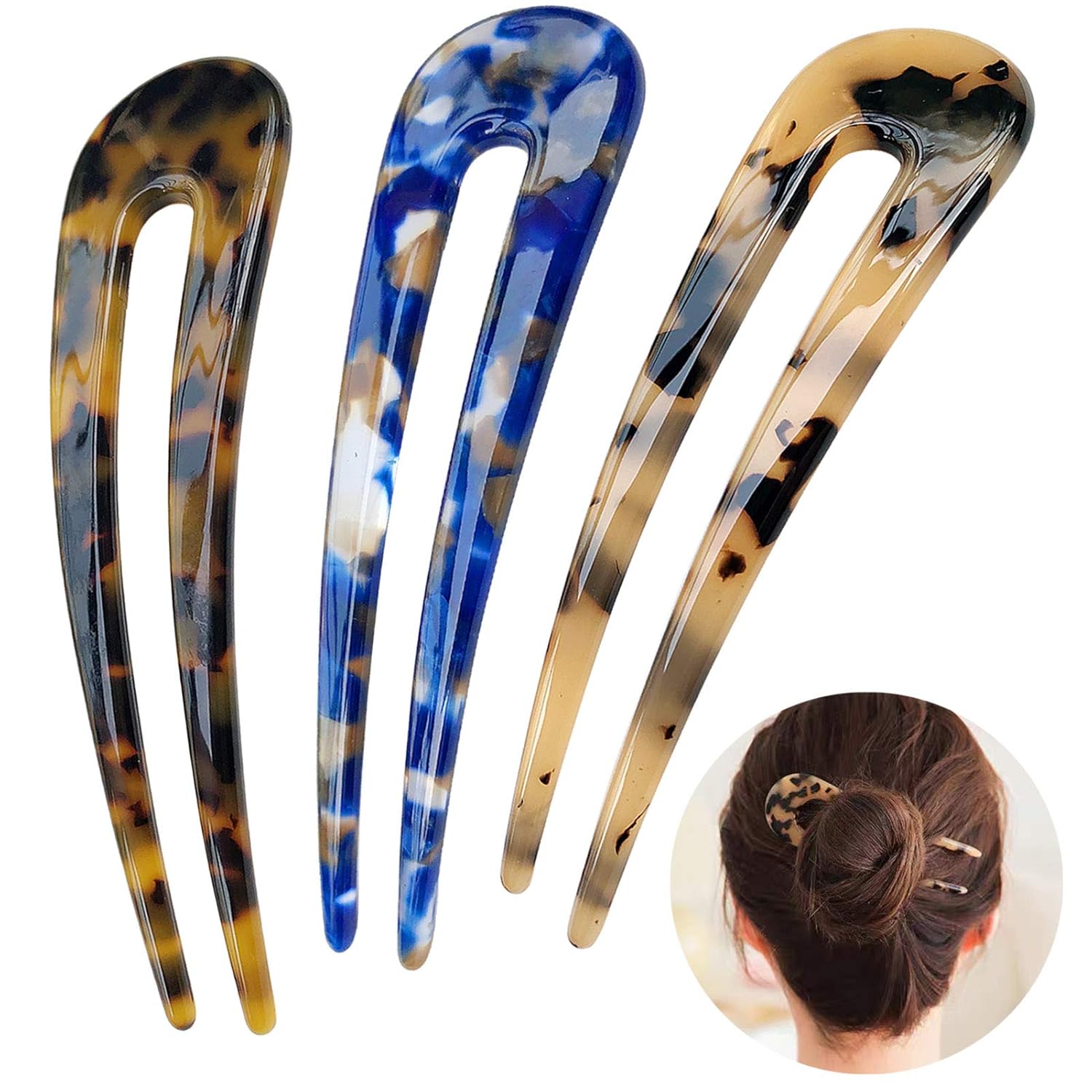 Drei Haarspangen aus Acryl in Schildpatt-Optik, blau und beige, für Hochsteckfrisuren.