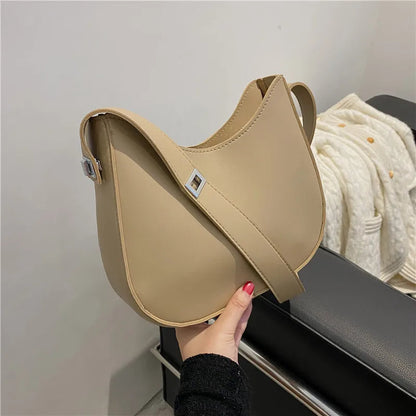 Beige Umhängetasche aus Leder, modisch, Damenaccessoire, elegantes Design, Handtasche.
