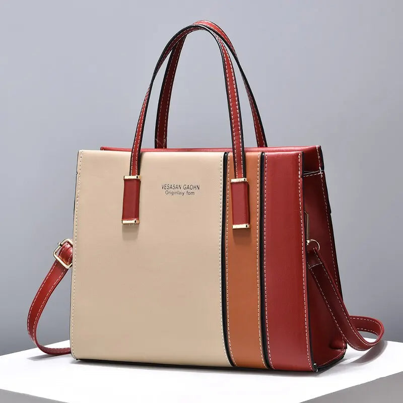 Damenhandtasche aus Leder, mehrfarbig, elegant, mit Schulterriemen, modisch, für Alltag.