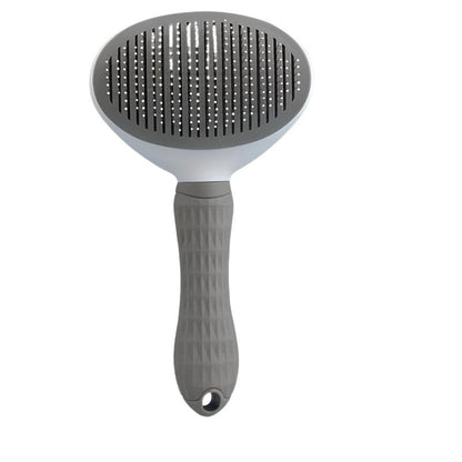 Graue Haustierbürste mit ergonomischem Griff, ideal für Fellpflege und Tierhaarpflege.