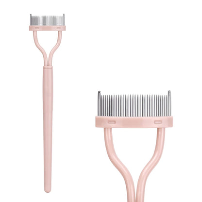 Rosa Haustierfellkamm mit Metallzinken, ergonomischer Griff, ideal für Hunde- und Katzenpflege.