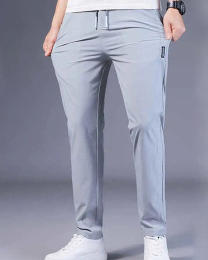 Graue Herren-Chinohose, lässig, Baumwolle, elastisch, mit Taschen, modisch, bequem.