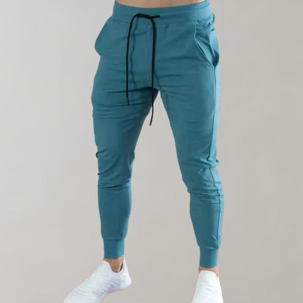 Blaue Jogginghose für Herren, elastisch, mit Kordelzug, bequem, sportlich, Freizeitmode.