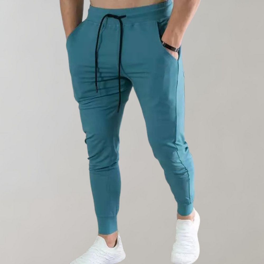 Herren Jogginghose blau, sportlich, bequem, mit Kordelzug, ideal für Fitness und Freizeit.