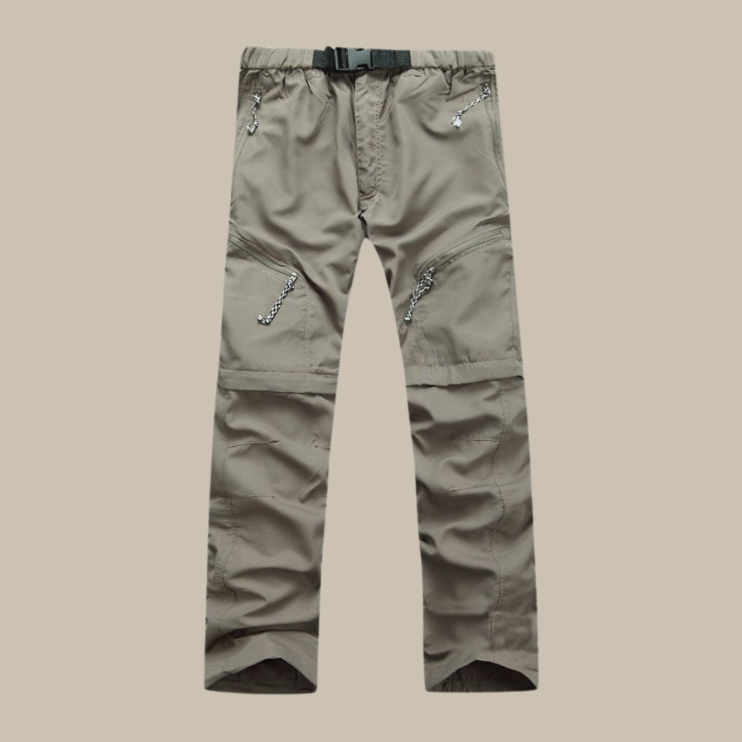 Graue Outdoor-Cargohose mit Reißverschlusstaschen, verstellbarem Gürtel, strapazierfähiges Material.