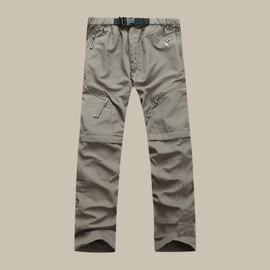 Graue Outdoor-Hose mit Reißverschlusstaschen, verstellbarem Gürtel, strapazierfähiges Material.