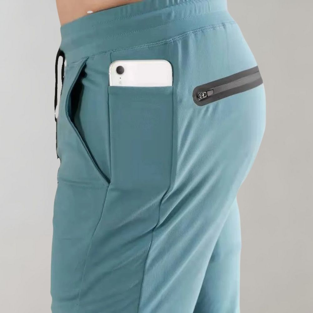 Herren-Shorts mit Reißverschlusstasche, blau, Smartphone, sportlich, bequem, atmungsaktiv.