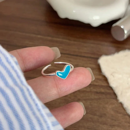 Silberner verstellbarer Ring mit blauem Herz, modisches Schmuckstück für Damen.