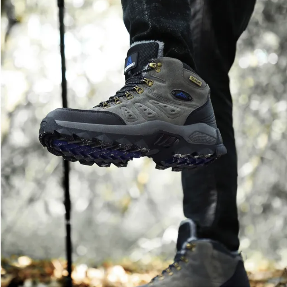 Grauer Wanderschuh aus Leder, rutschfeste Sohle, Outdoor, Herren, robust, langlebig.