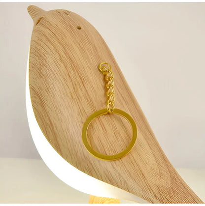 Holz-Vogel-Schlüsselanhänger, goldener Ring, dekorativ, modernes Design, Geschenkidee.