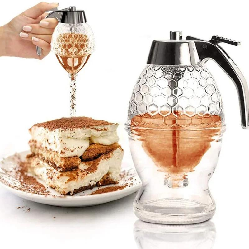 Honigspender aus Glas mit Wabenmuster, ideal für Desserts, ergonomischer Griff, transparent.