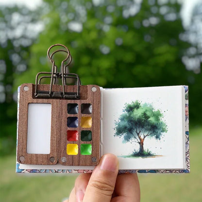 Mini-Aquarell-Set mit Baum-Motiv, tragbar, Holzpalette, 8 Farben, ideal für unterwegs.