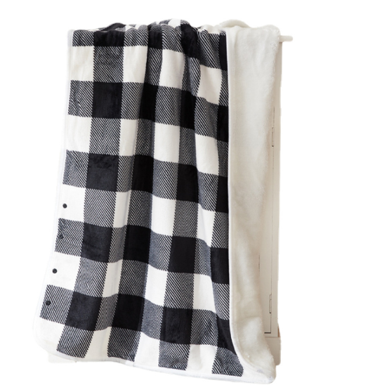 Schwarz-weiß karierte Decke, weiches Fleece, gemütlich, ideal für Sofa oder Bett.