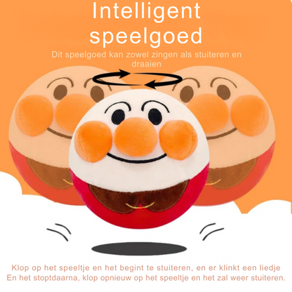 Intelligentes Spielzeug, orange-weiß, singend und drehend, für Kinder, lustig und interaktiv.
