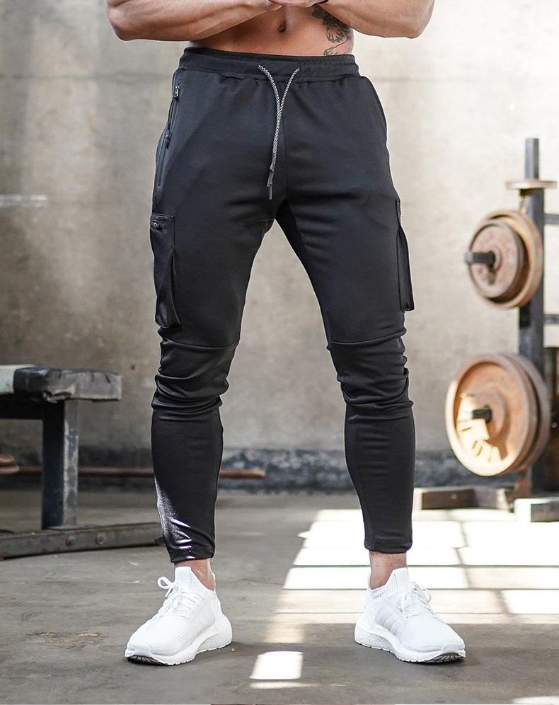 Schwarze Jogginghose Herren, Sportbekleidung, Fitnessstudio, elastisch, mit Taschen.