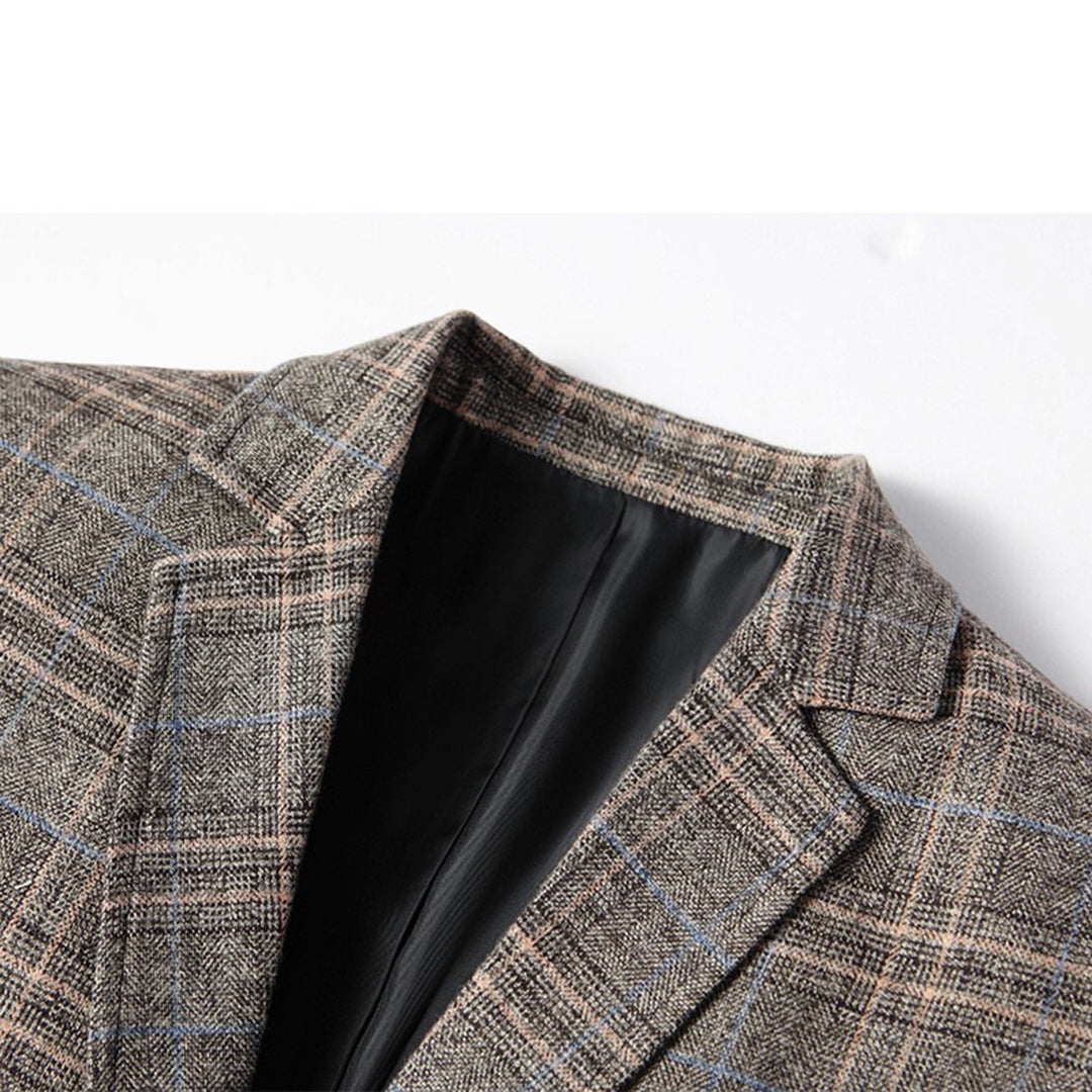 Graues kariertes Sakko aus Wolle, Herrenmode, elegantes Design, Nahaufnahme, klassischer Stil.