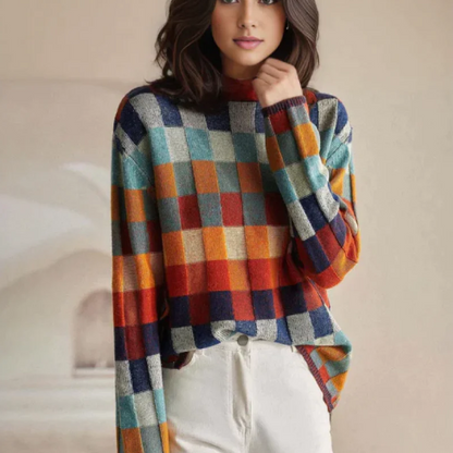 Frau in kariertem Pullover, bunte Herbstfarben, lässiger Stil, Mode für Damen, gemütlich.