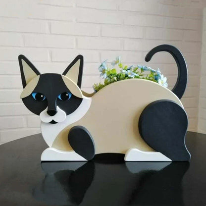 Katzenförmiger Blumentopf, schwarz-weiß, aus Holz, mit Blumen, Gartendekoration.