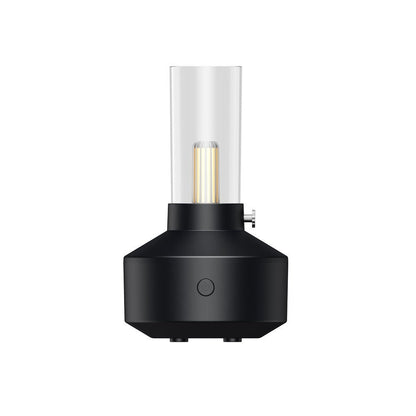 Schwarzer Aromatherapie-Diffuser mit Kerzenlicht-Design, Glaszylinder, LED-Licht.
