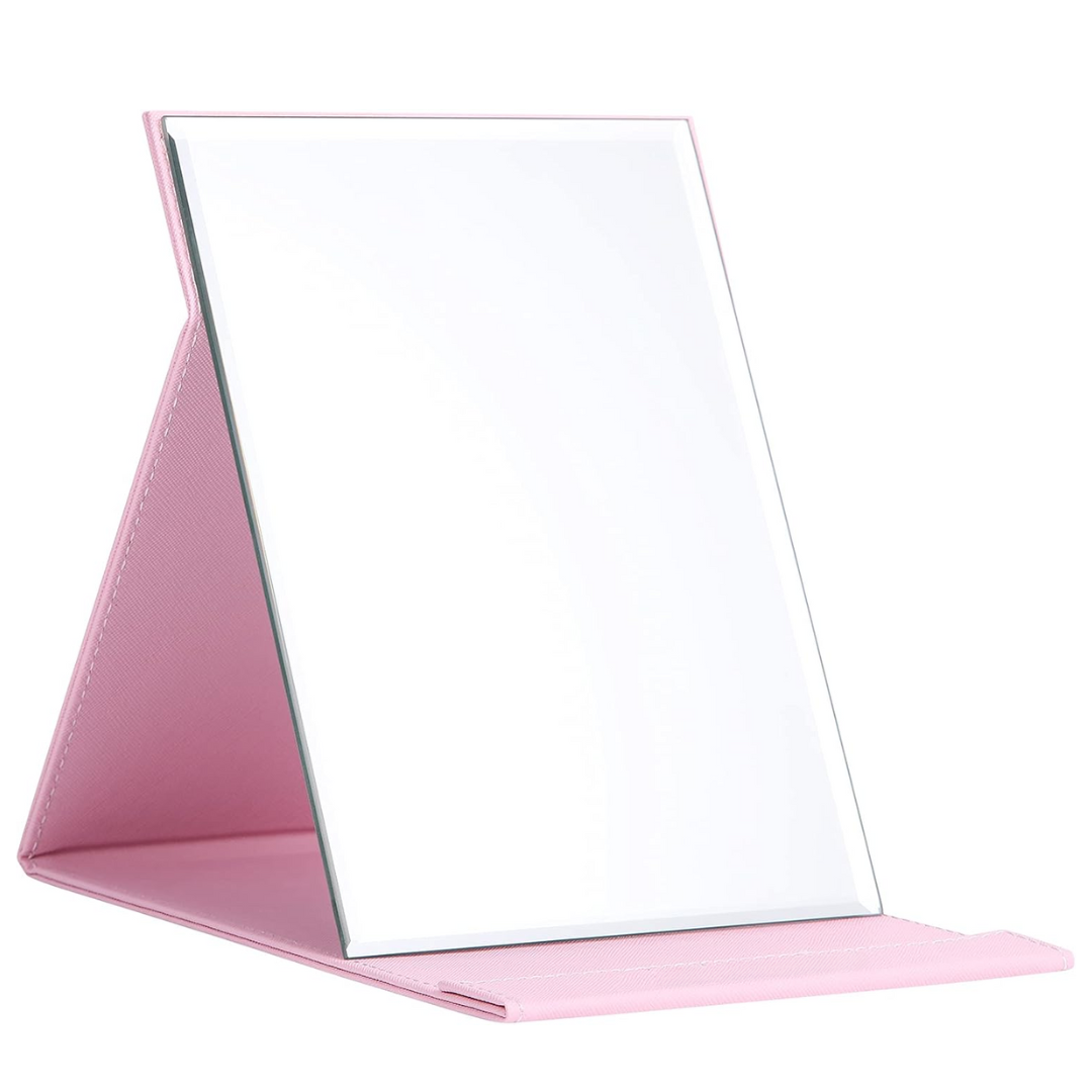 Rosa klappbarer Schminkspiegel, tragbar, rechteckig, ideal für Reisen und Make-up.