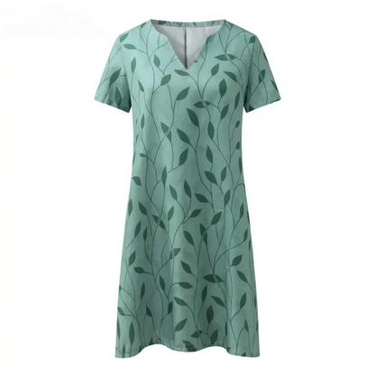 Grünes Damenkleid mit Blattmuster, V-Ausschnitt, kurzärmelig, Sommermode, Baumwolle.