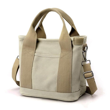 Beige Canvas-Umhängetasche für Damen, kleine Größe, verstellbarer Riemen, modisch und praktisch.