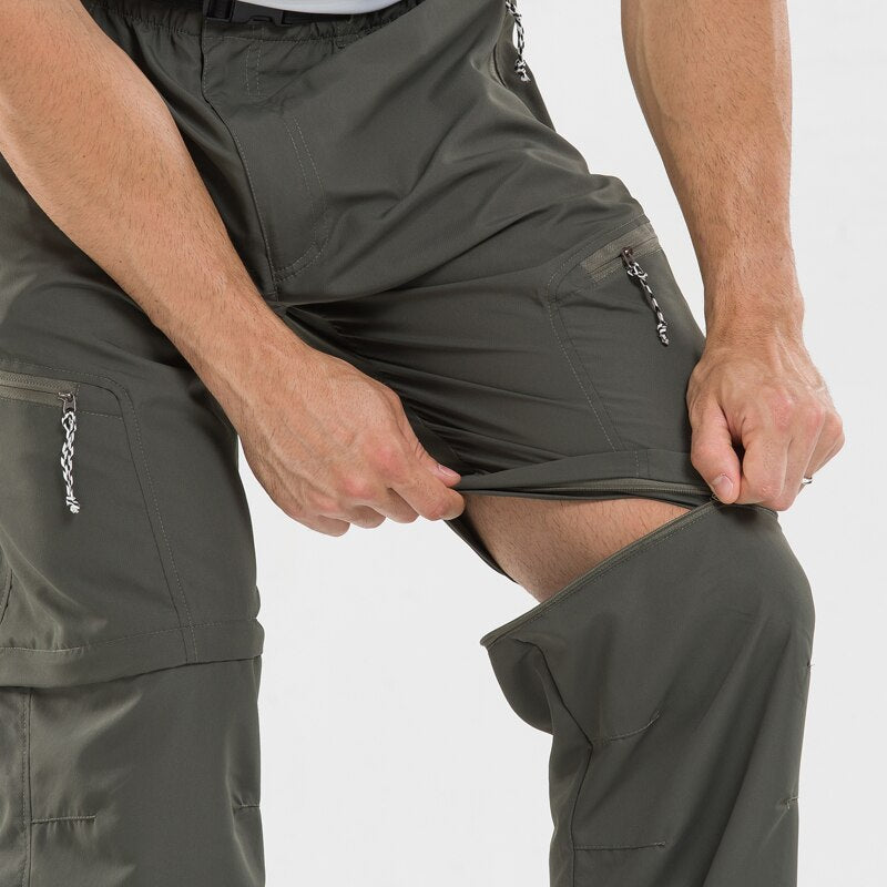 Grüne, abnehmbare Outdoor-Hose für Herren, elastisch, mit Reißverschlüssen, ideal für Wandern.