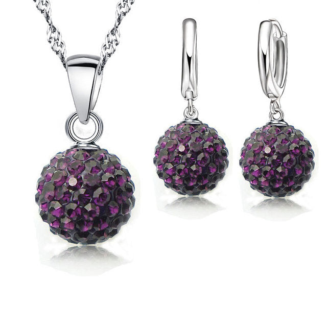925er Silber Schmuckset mit lila Kristallanhänger und Ohrringen für Damen.
