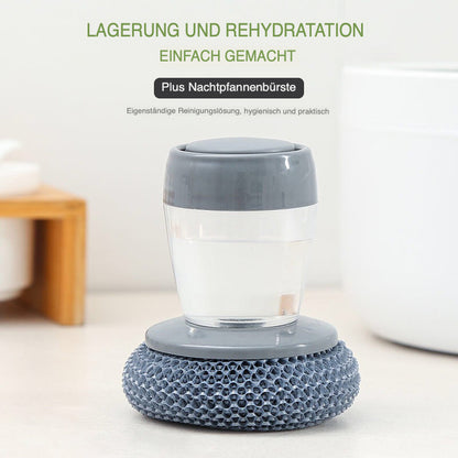 Graue Küchenseifenpresse mit Spender und Palmbürste, ideal für Reinigung, hygienisch, praktisch.