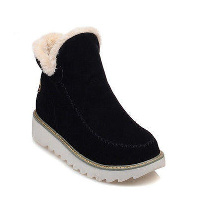 Schwarze Damen-Halbstiefel mit weißem Kunstfell, rutschfeste Sohle, warm und kuschelig.