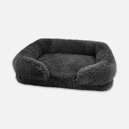 Graues, flauschiges Hundebett, rechteckig, aus Plüsch, ideal für Komfort und Entspannung.