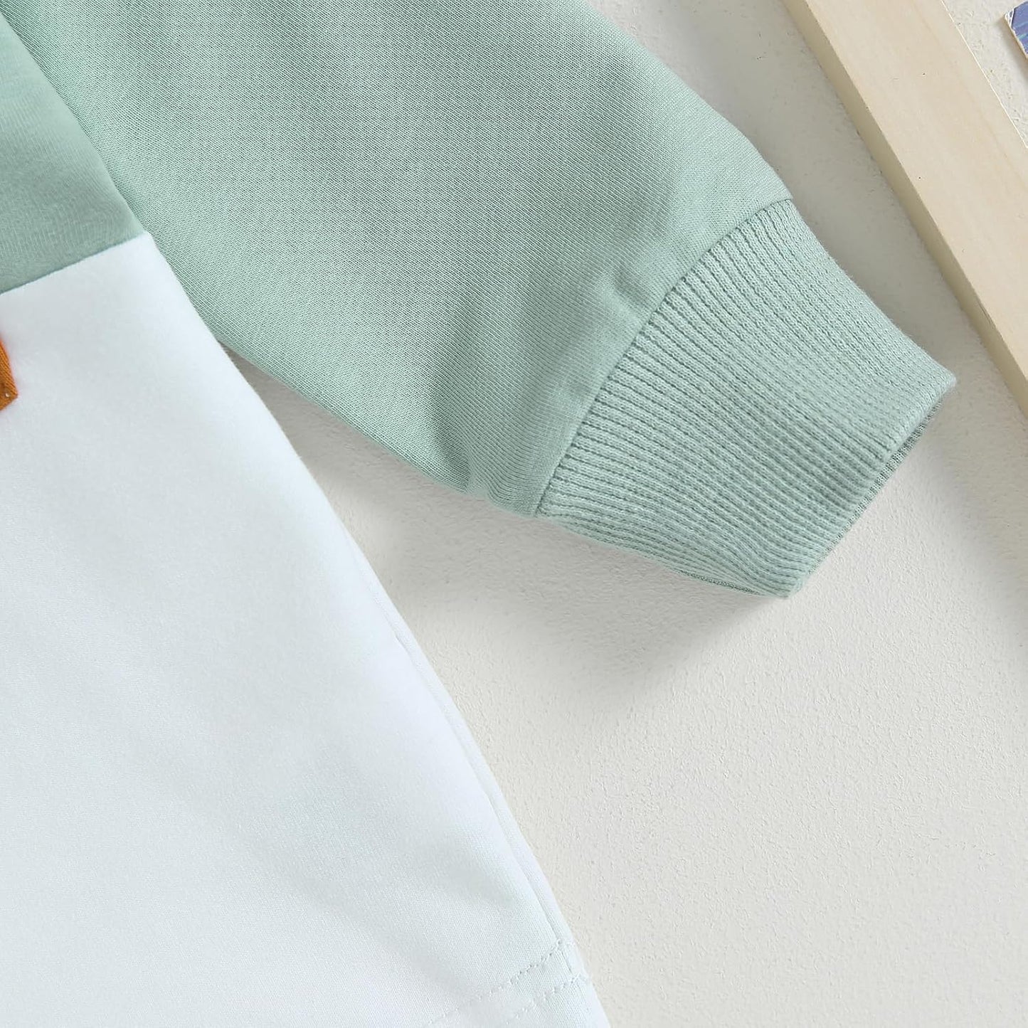 Grünes Langarmshirt aus Baumwolle für Kinder, weicher Stoff, modisches Design.