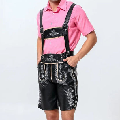 Mann in schwarzer Lederhose mit Stickerei, rosa Hemd, traditionell bayerische Tracht.