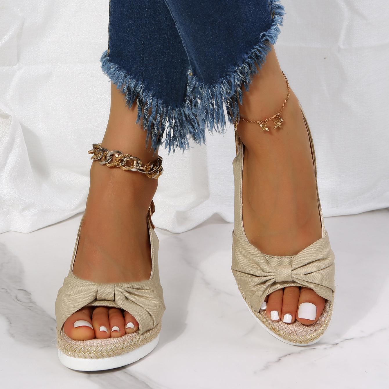 Damen-Sandalen beige mit Schleife, offener Zeh, Espadrille-Sohle, modisch, bequem.