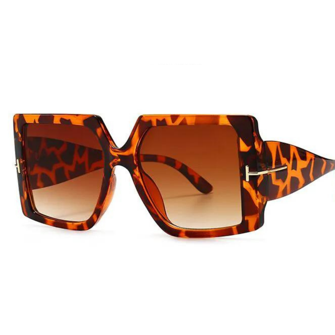 Große eckige Sonnenbrille, Leopardenmuster, braune Gläser, modisch, Damenaccessoire.